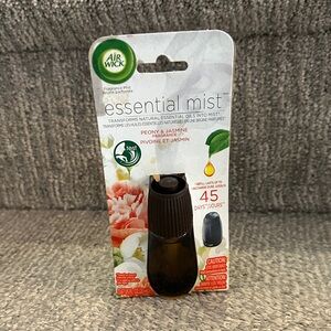 Air Wick Essential Mist Diffuser Refill in the Peony & Jasmine scent